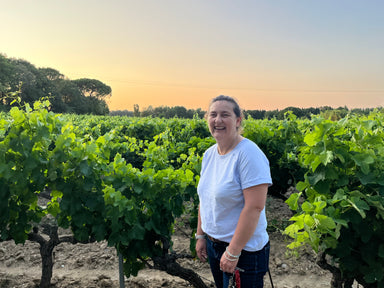 Visiting with proprietor Caroline Charrier in her vineyard at sunset on June 17, 2025.
